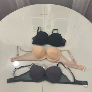 3 Bras. Black, White, Cream